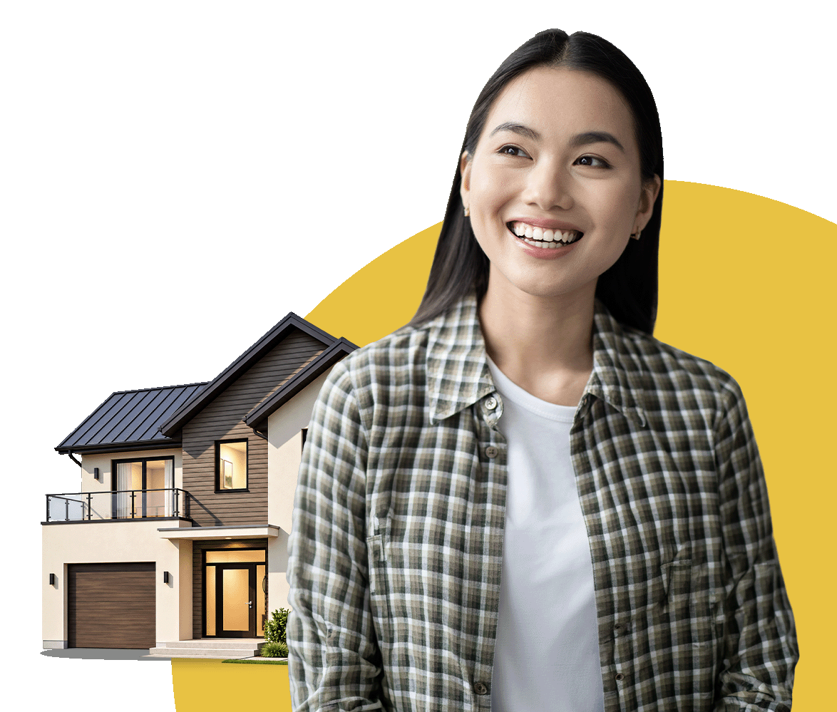 A smiling Filipino homeowner beside a modern house